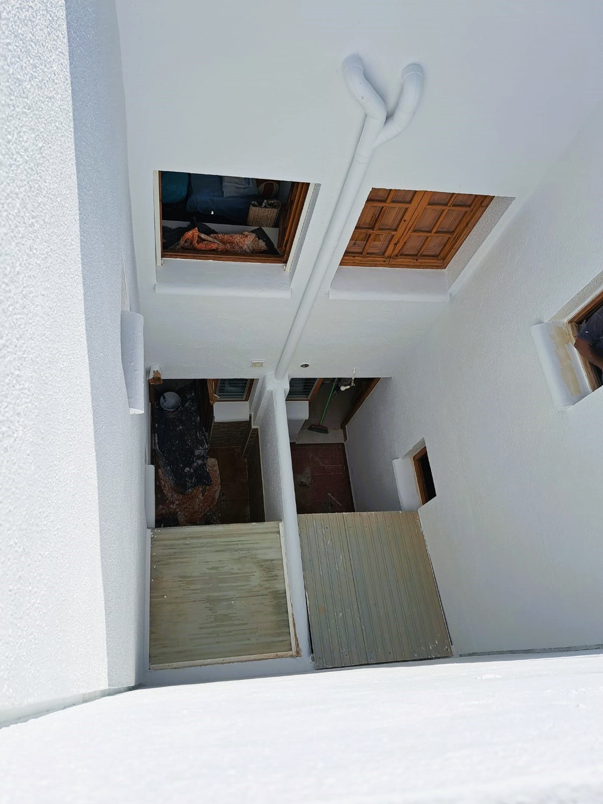 TRABADO DE LIMPIEZA, REHABILITACIÓN Y PINTURA DE FACHADA EN ACABADO LISO